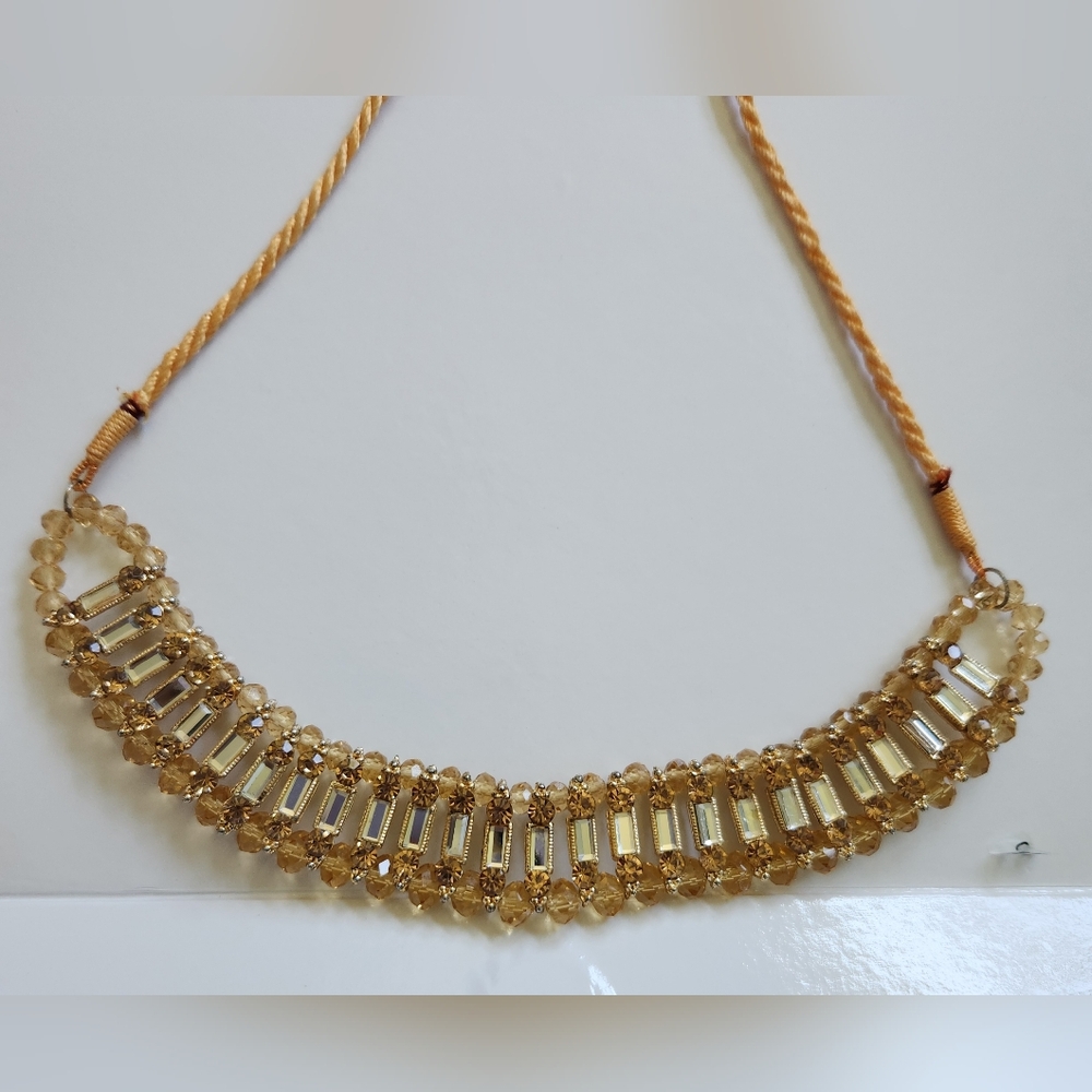 Champagne tassel necklace. Adjustable length